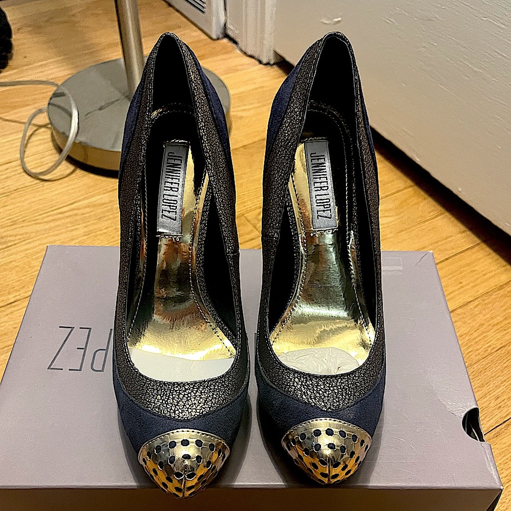 Jennifer Lopez navy suede heels with gold accents